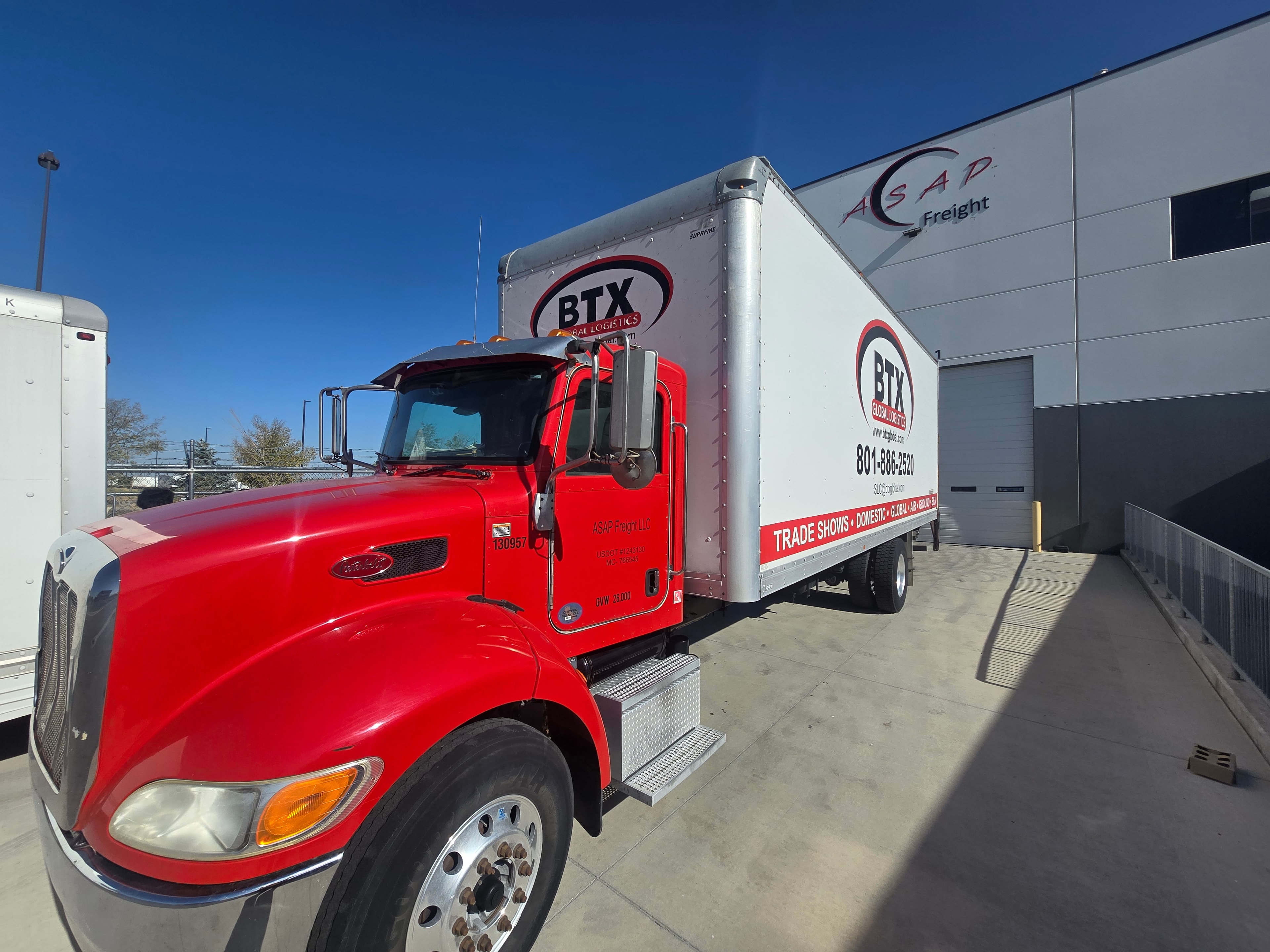 BTX Global Logistics Peterbilt — front angle showing box graphics before fleet de-identification