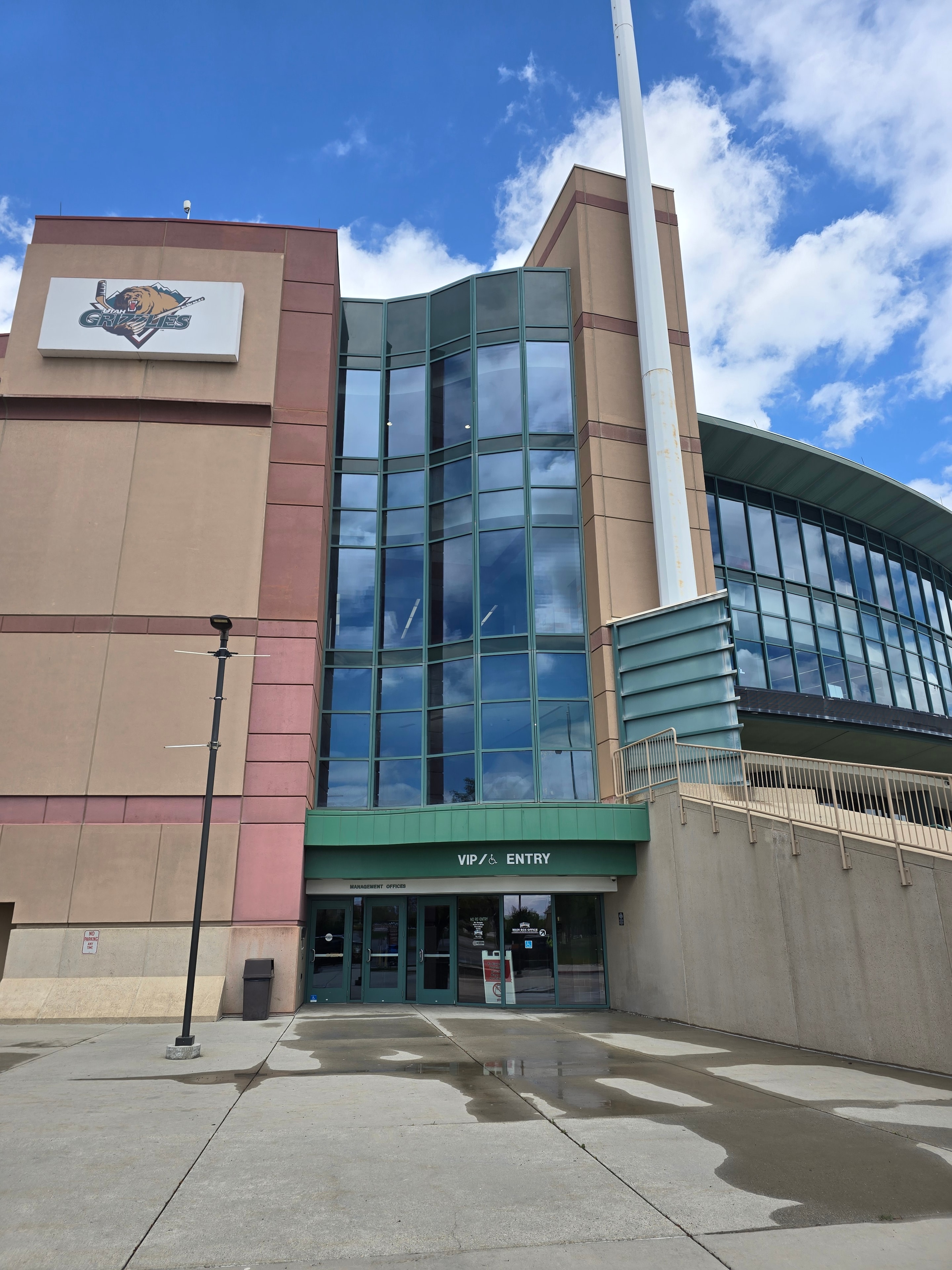 Bucked Up window wrap at Maverick Center after cleaning — restored facade, West Valley City, Utah