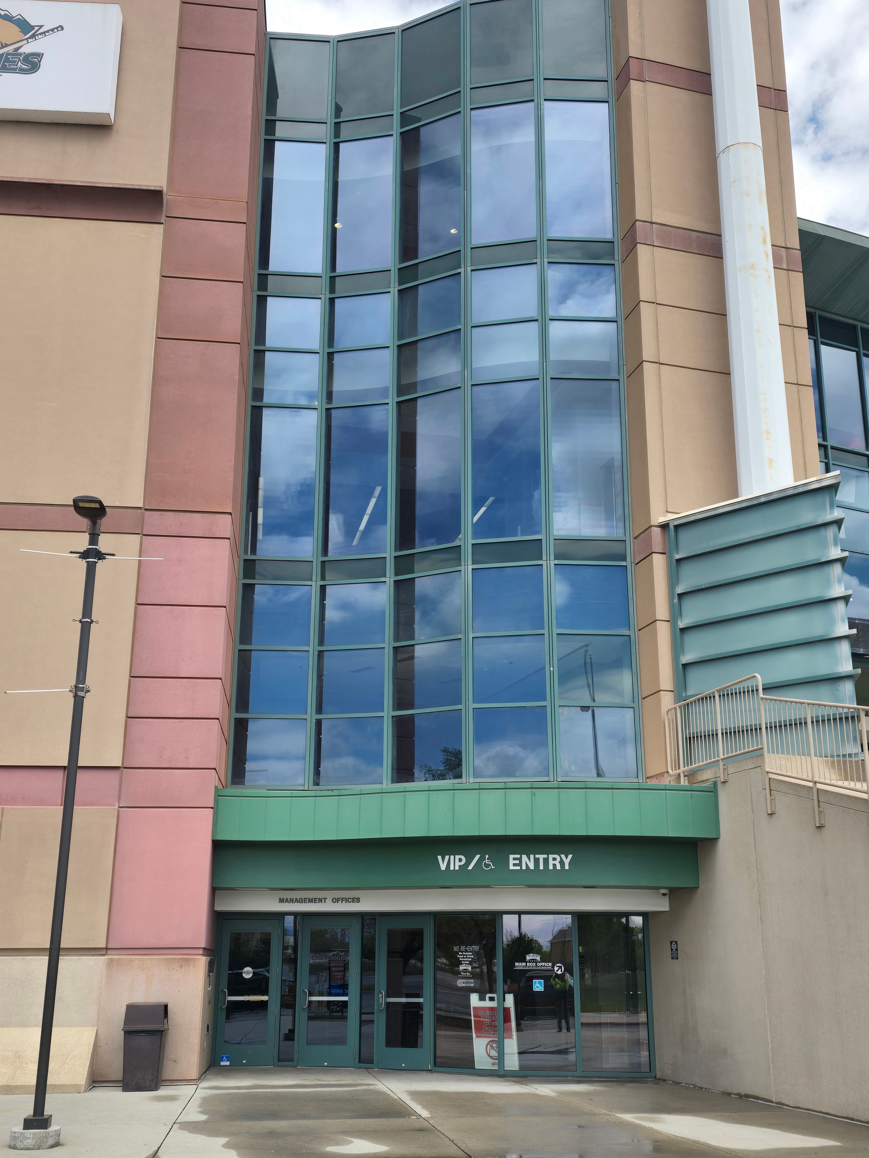 Wide shot of Maverick Center arena exterior after Bucked Up wrap cleaning — Power Stream USA