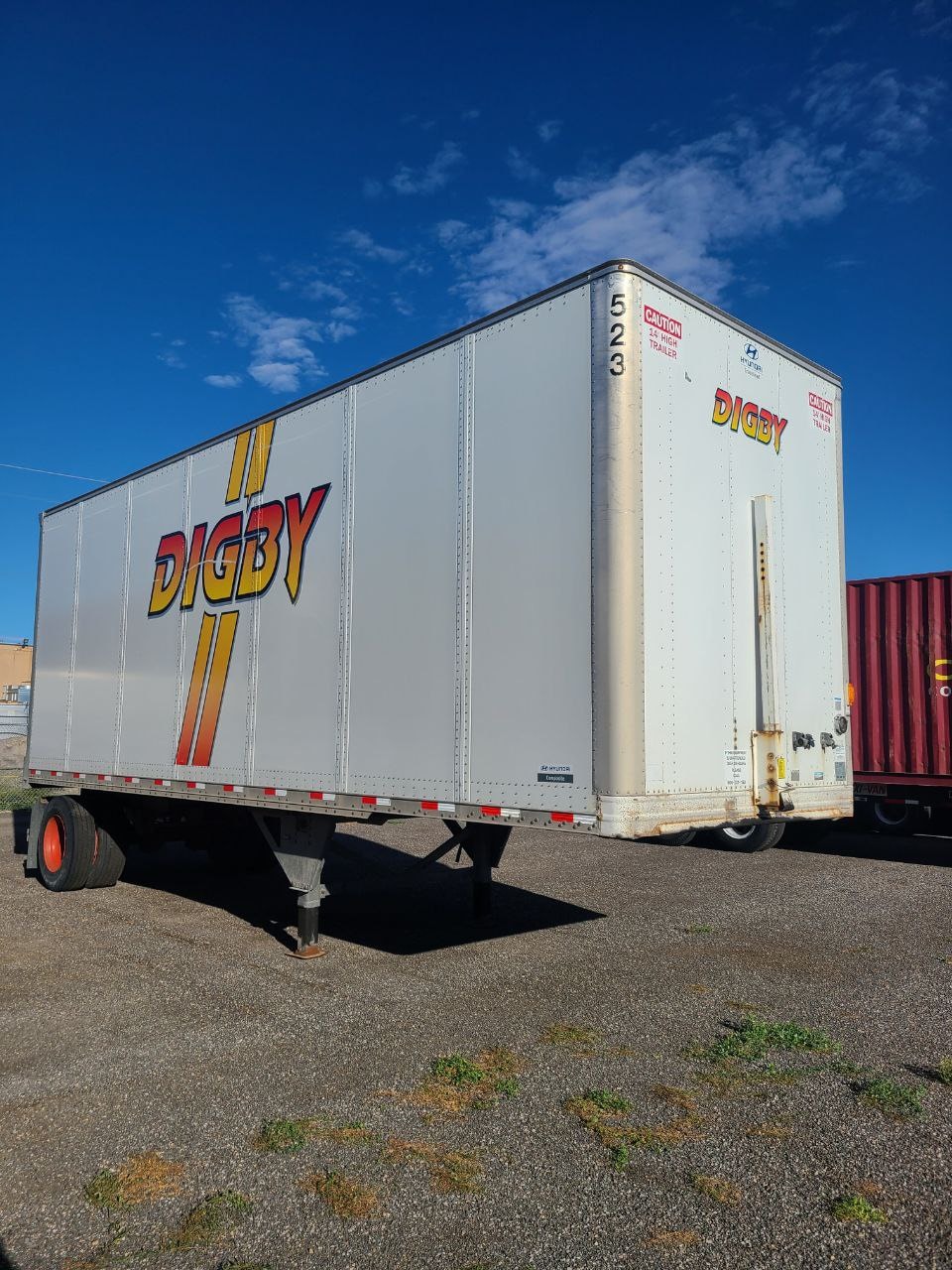 Single Digby pup trailer showing full side panel branding before de-identification