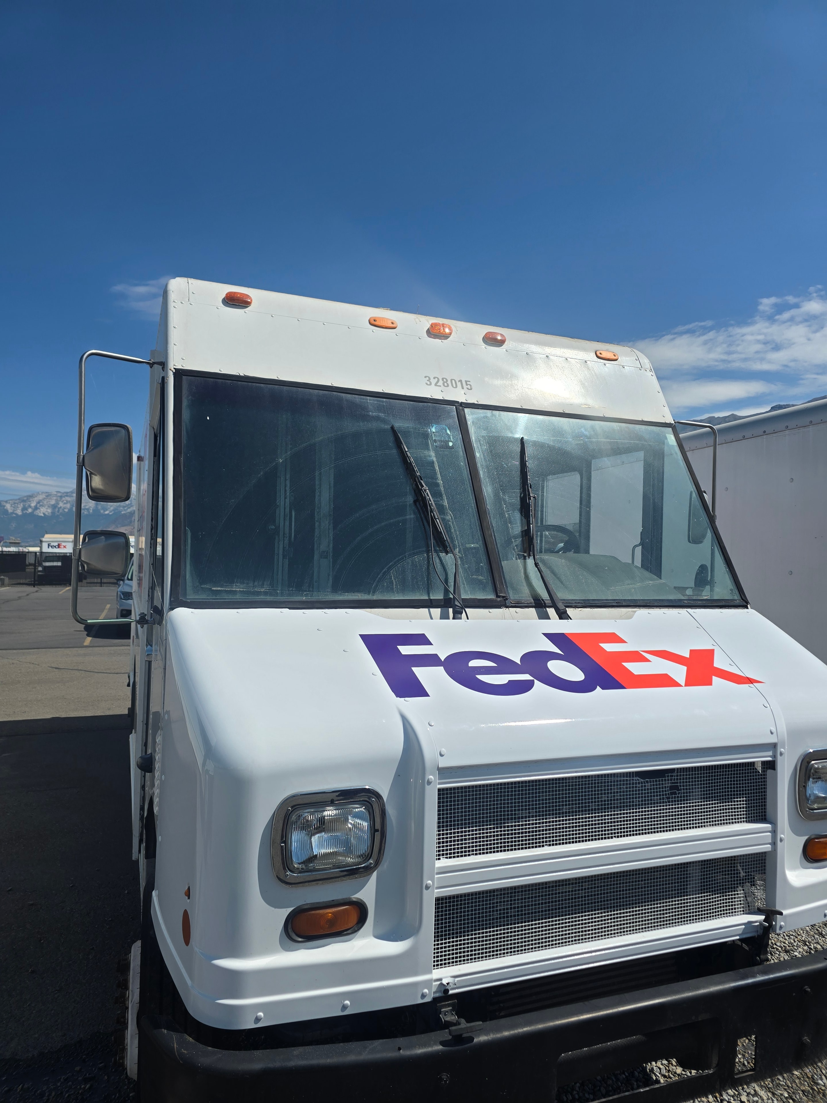 FedEx step van completed after fleet de-identification and decal installation — Utah mobile fleet service